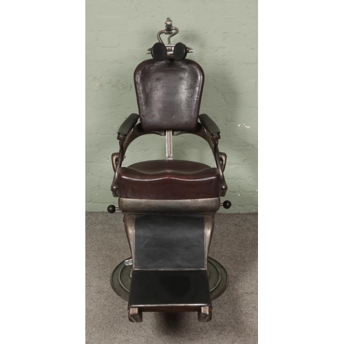 600 - An early to mid 20th century dentist chair. Bearing plaque for Sterling Dental Chair by The Amalgama... 