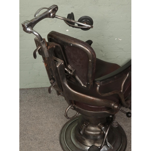 600 - An early to mid 20th century dentist chair. Bearing plaque for Sterling Dental Chair by The Amalgama... 