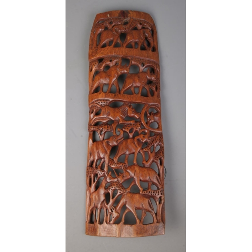 91 - A quantity of wooden wares, to include carved animal wall plaque, lighthouse and driftwood mounted o... 