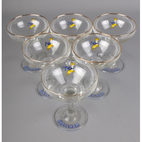103 - Six Babycham glasses with gilt rim.