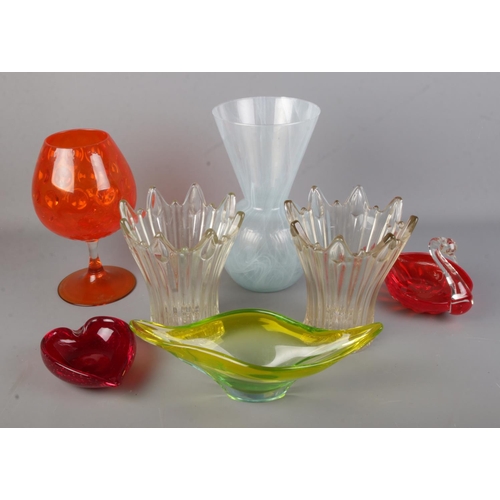 113 - A quantity of coloured art glass including large orange centre piece and red colour swan dish.