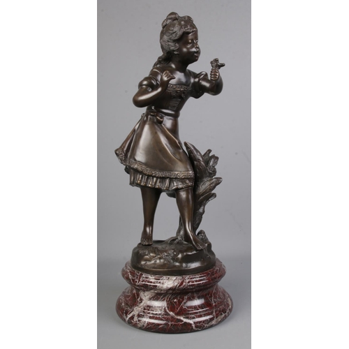161 - After Auguste Moreau, a large bronze sculpture depicting a girl with bird on marble base.

Hx48cm