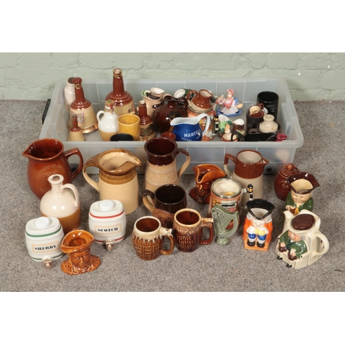 175 - A collection of ceramics including toby/character jugs and other brewery/alcohol collectables.