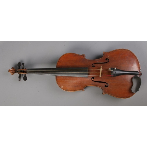59 - An antique two piece back violin in case.

Body length 36cm
