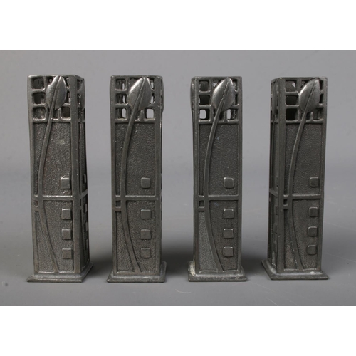 511 - A set of four pewter miniature vases in the manner of Charles Rennie Mackintosh produced by A.E.Will... 