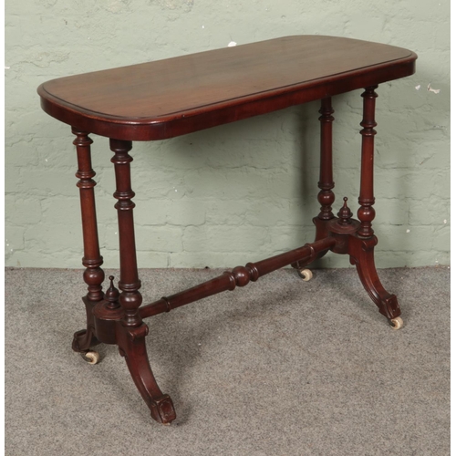 561 - A Victorian mahogany side table on casters

Hx72cm
Wx89cm
Dx44cm