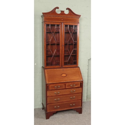 575 - A late 19th century mahogany marquetry inlaid bureau bookcase with astragal glaze doors and marquetr... 