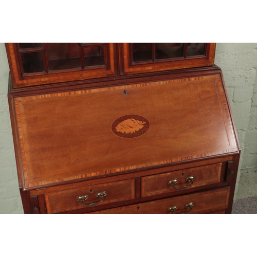 575 - A late 19th century mahogany marquetry inlaid bureau bookcase with astragal glaze doors and marquetr... 