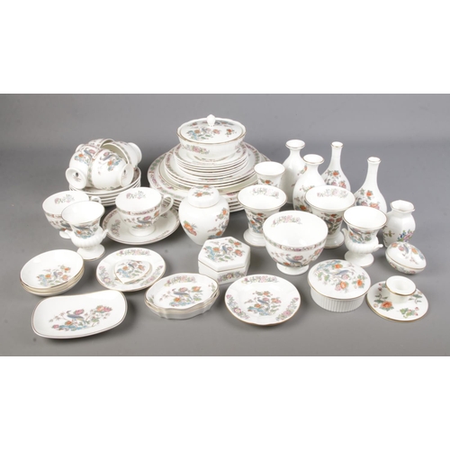 97 - A large quantity of Wedgwood Kutani Crane ceramics including cups and saucers, ginger jar, trinket b... 