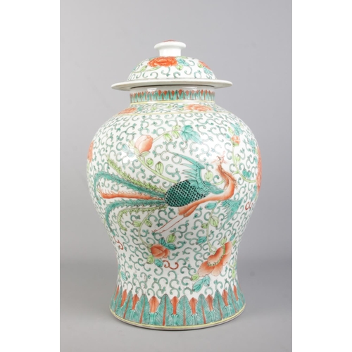 97 - A large Chinese Famille Vert dragon jar with cover, of baluster form. Featuring central dragon in fr... 