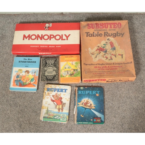 249 - A collection of vintage children's games and books to include boxed Subbuteo Table Rugby, Monopoly, ... 