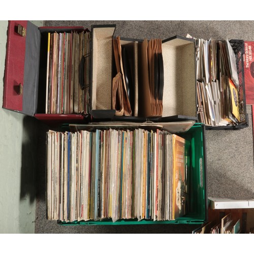 257 - Three boxes and two cases of assorted records. Single records include Queen, The Beatles, UB40, Thin... 