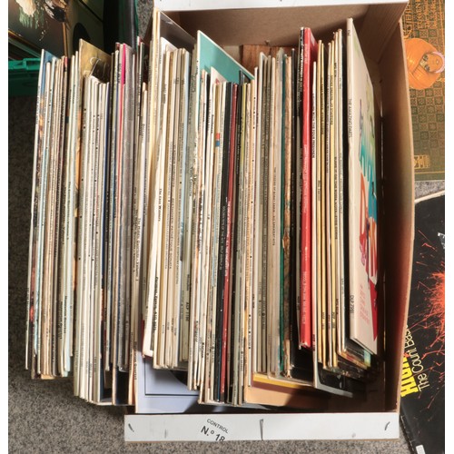 257 - Three boxes and two cases of assorted records. Single records include Queen, The Beatles, UB40, Thin... 