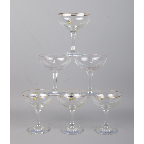 193 - Six babycham glasses; two with hexagonal stem, four with gilt rim.