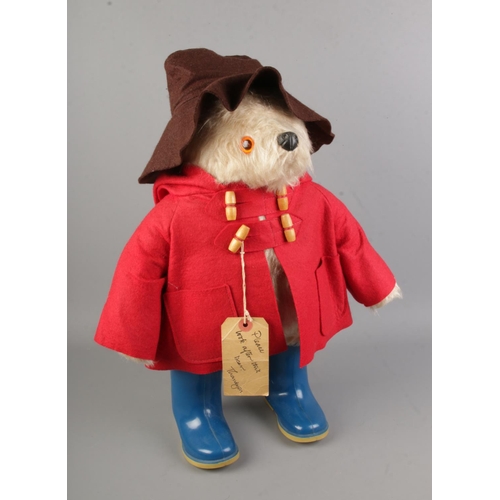 104 - A Gabrielle Design Paddington Bear with blue boots, red jacket and brown hat.