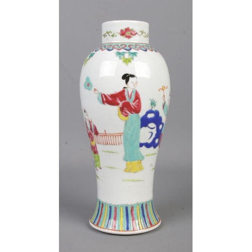 11 - A mid Twentieth Century Chinese Famille Rose vase, depicting children playing. Bearing character mar... 