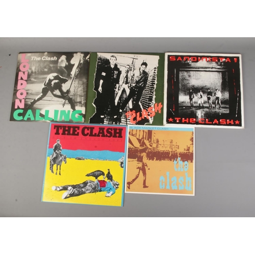 116 - A collection of records by The Clash including Black Market Clash, London Calling, The Clash, Sandin... 