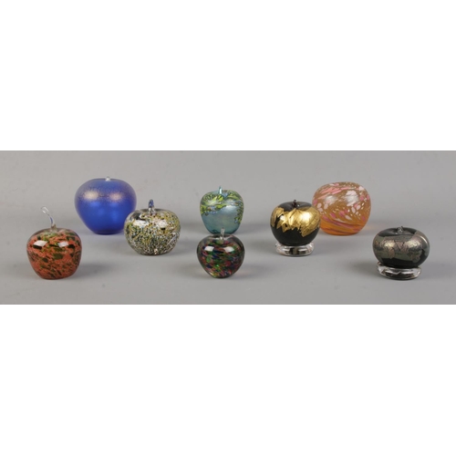 135 - Eight glass paperweights, all formed as apples. To include examples from Tweedsmuir and Avondale