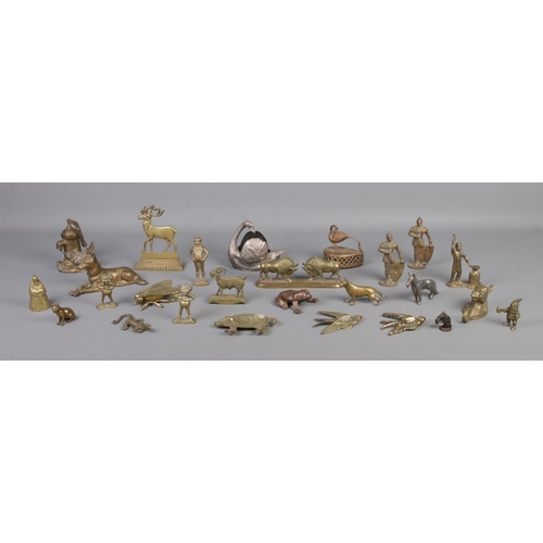 14 - A large quantity of metal animals and figures, including many brass examples. Contains Peerage frog ... 