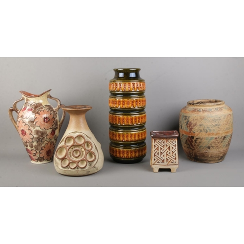 155 - Five assorted pieces of stoneware, to include West Germany cylindrical vase in the 268-40 pattern, s... 