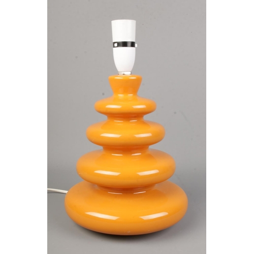 159 - A retro table lamp of orange beehive/wiggle form.