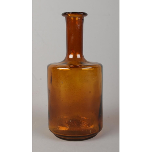 163 - A Holmegaard style amber glass narrow neck vase. Height: 22cm.