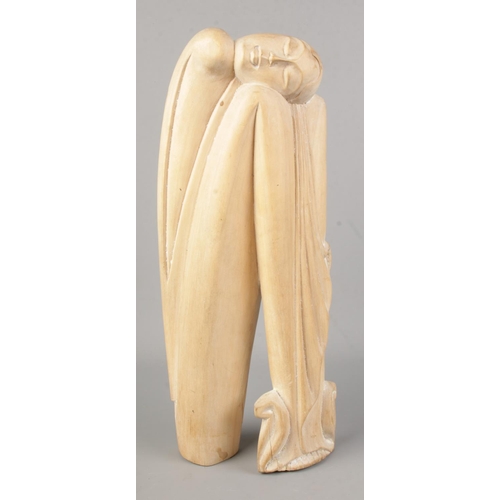 177 - After Willi Soukop, an Art Deco hand carved wooden sculpture of a seated woman.

Hx36cm