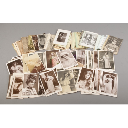 184 - A large quantity of Edwardian postcards mainly consisting of famous actresses of the time including ... 