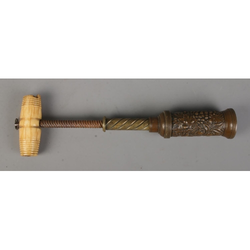 2 - A Thomason type corkscrew, having bone handle and vine decoration to barrel.