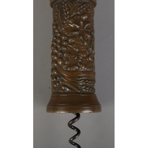 2 - A Thomason type corkscrew, having bone handle and vine decoration to barrel.