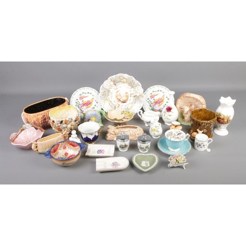 22 - A collection of assorted named ceramics to include Rockingham plate, Meissen teacup, Sylvac, Quimper... 