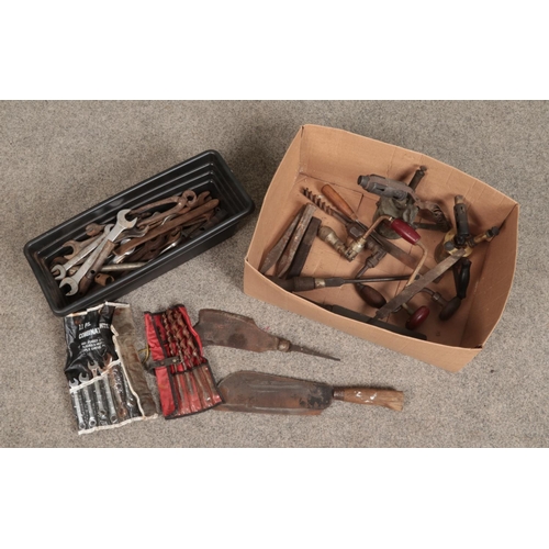 201 - Two boxes of vintage hand tools. Includes billhooks, spanners, blow torches, bits and braces etc.