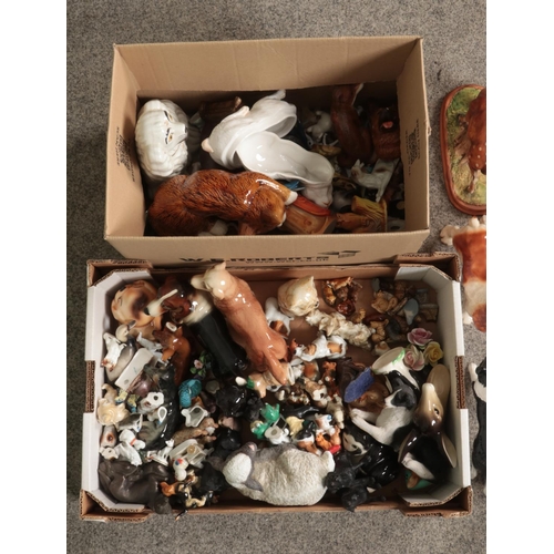 205 - Two boxes of assorted ceramic animals to include Coopercraft dogs, Wade Whimsies,  Sandygate, Midwin... 