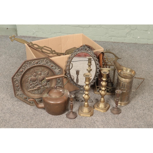 208 - One box of assorted metal wares to include brass framed mirror, fire companion set, mixed candlestic... 