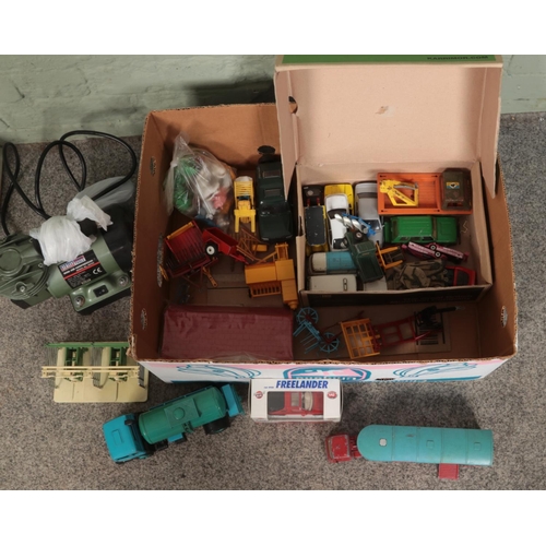 227 - A box of assorted vintage toys and die-cast vehicles, together with a Sealey Mini Air Compressor. In... 