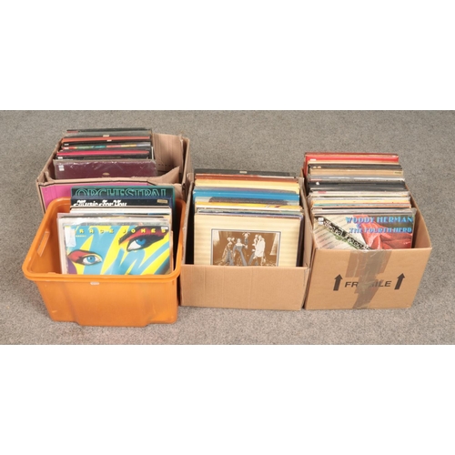 228 - Four boxes of records. Includes Rick Wakeman, Grace Jones, Japan, classical box set etc.