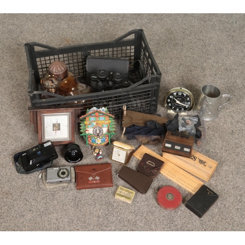 245 - A box of miscellaneous. Includes Keller cuckoo clock, barometer, Chinon binoculars, Sirius Semi Fish... 