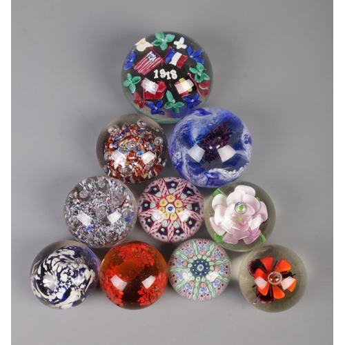 6 - Ten assorted glass paperweights, including one with 1918 insert, millefiori and Caithness examples.