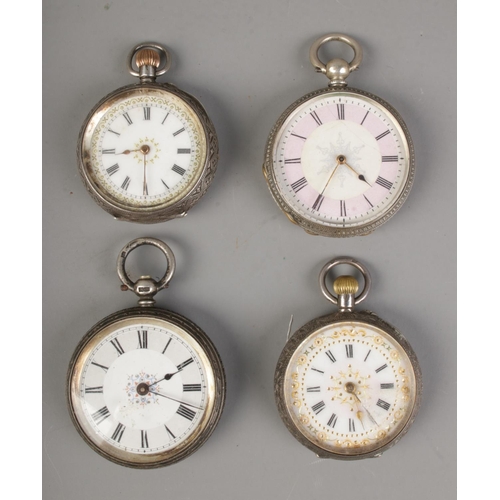 451 - A collection of four silver fob watches including pink enamel faced design.