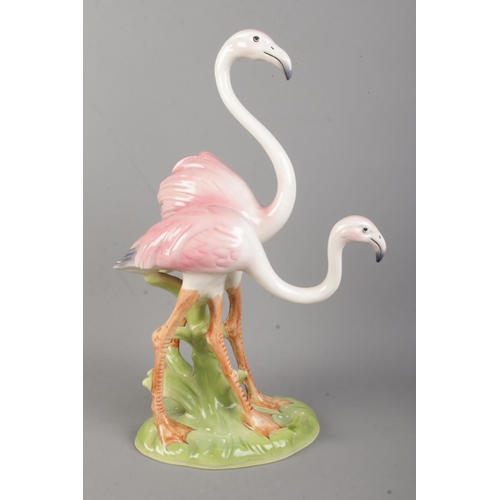 70 - After Giovanni Ronzan ceramic figure depicting a pair of flamingos. Ronzan, Made in Italy sticker to... 