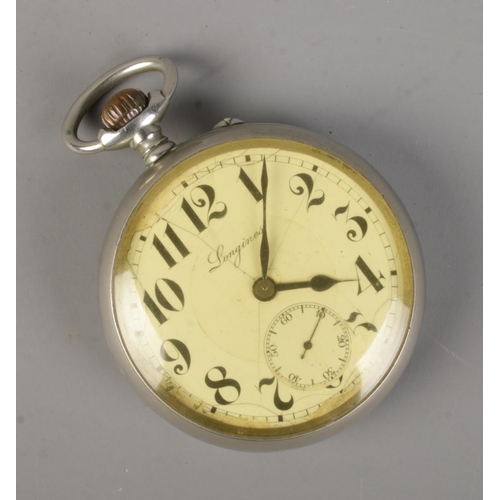 456 - A white metal Longines railway pocket watch. Engraved to back with train and monogram. The cuvette m... 