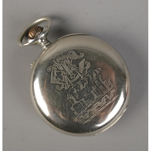 456 - A white metal Longines railway pocket watch. Engraved to back with train and monogram. The cuvette m... 