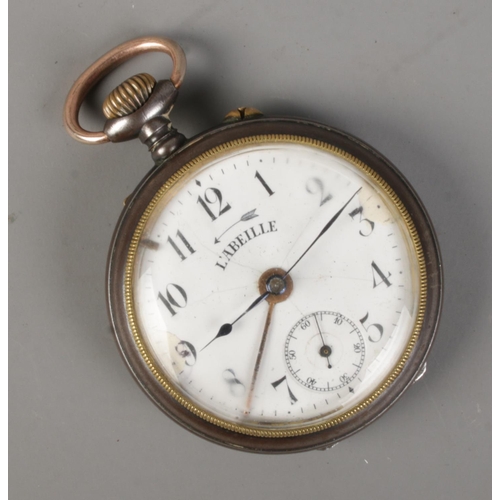 457 - A French gun metal alarm pocket watch. The dial marked L'Abeille.