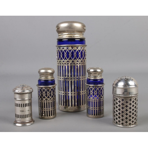 474 - A collection of antique salt and pepper shakers including silver example assayed Birmingham 1927 Doc... 