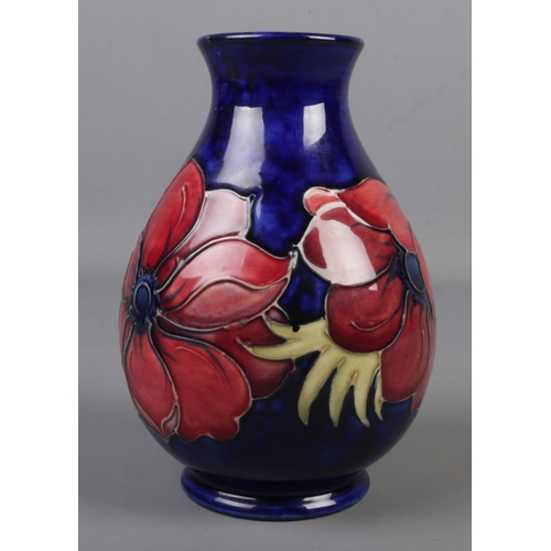 479 - A Moorcroft pottery baluster shaped vase decorated in the Anemone design. Impressed factory mark and... 