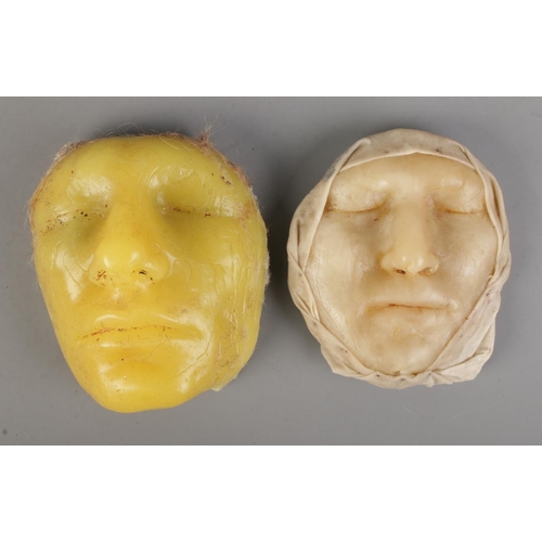 485 - Two late Victorian wax death masks, possibly French, to include example partially wrapped in waxed f... 