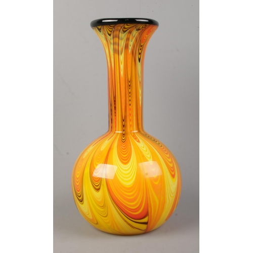 496 - A 1970's Opaline art glass vase, in the style of Carlo Moretti. With orange/yellow swirls and black ... 