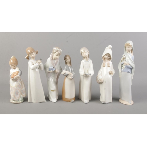 500 - Seven Lladro ceramic figures to include King Gasper and Shepard from a nativity scene, Valencia girl... 