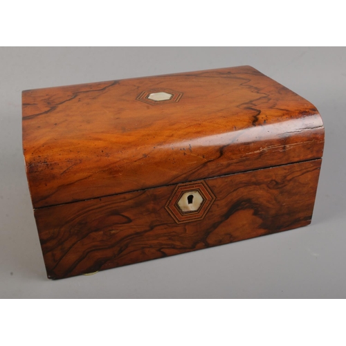 75 - A Victorian walnut jewellery box with mother of pearl inlay and parquetry detail.