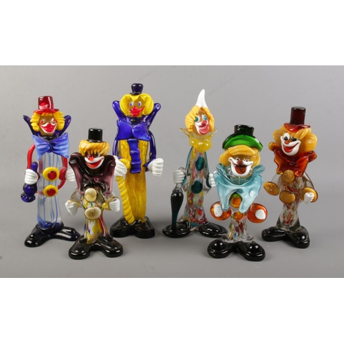 81 - Six Murano style glass clowns.